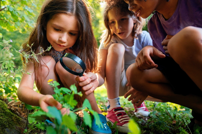 Low angle kids with magnifying glass 1